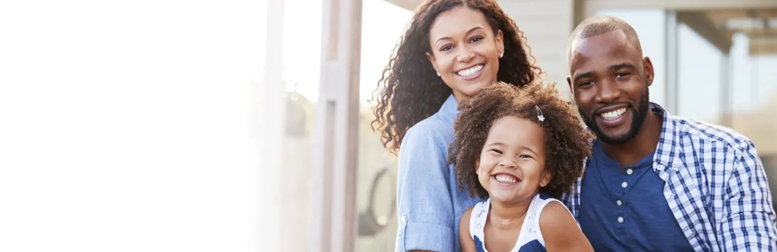 Happy family at beach house